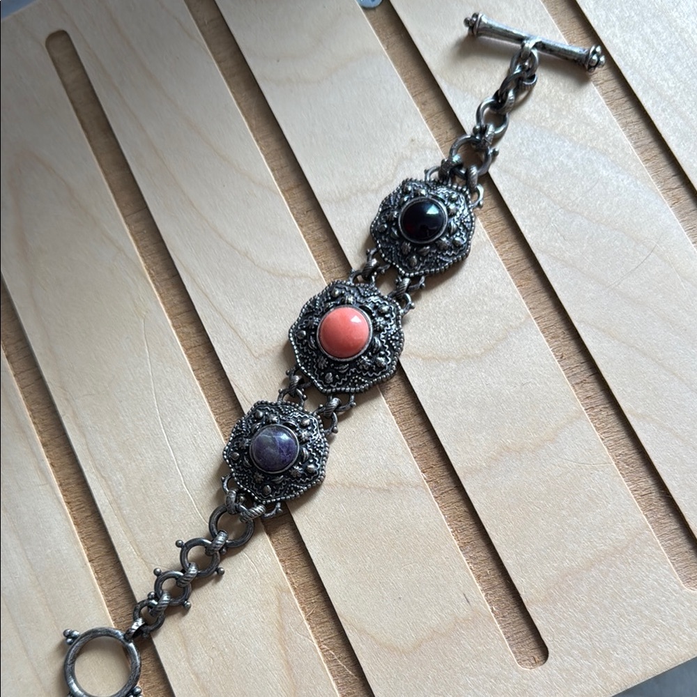 Silver Lucky Brand Bracelet with Black, Pink, and Purple Accents